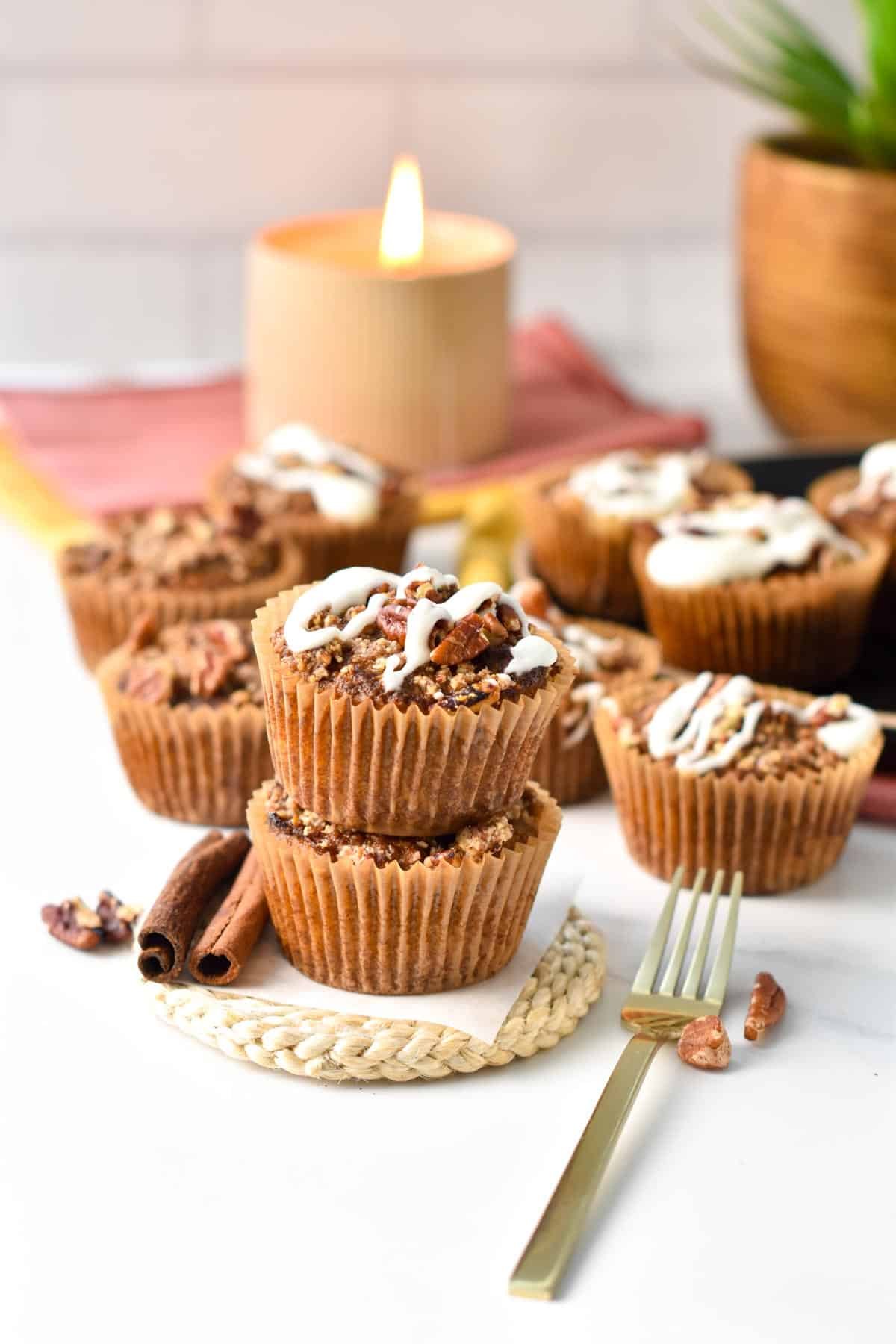 Almond Flour Pumpkin Muffins in front of a festive table.
