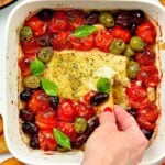 This Baked Feta Dip is a the most delicious hot dip with Meditareean flavors. A creamy cheese feta dip baked with olives, roasted cherry tomatoes and garlic.