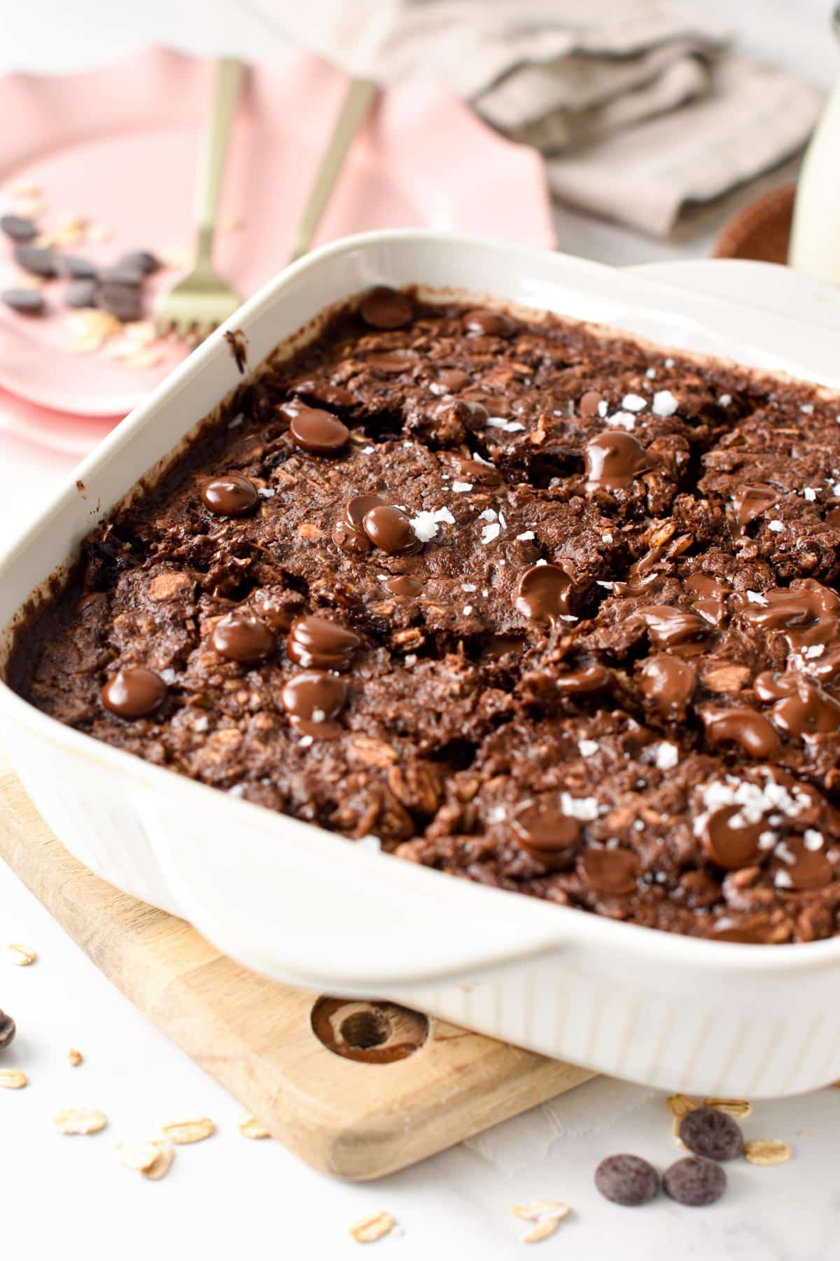This Baked Brownie Oatmeal is a creamy chocolate baked oatmeal recipe filled with 9 grams of protein per serving for a healthy breakfast.