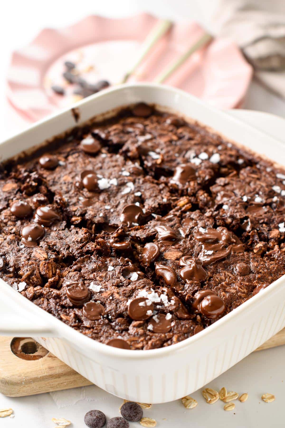 This Baked Brownie Oatmeal is a creamy chocolate baked oatmeal recipe filled with 9 grams of protein per serving for a healthy breakfast.