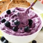 This Blueberry Cream Cheese is a tasty sweet cream cheese spread that taste like blueberry cheesecake. It's a delicious addition to toasted English muffins, and bagels or to eat by the spoon as a sweet treat.This Blueberry Cream Cheese is a tasty sweet cream cheese spread that taste like blueberry cheesecake. It's a delicious addition to toasted English muffins, and bagels or to eat by the spoon as a sweet treat.