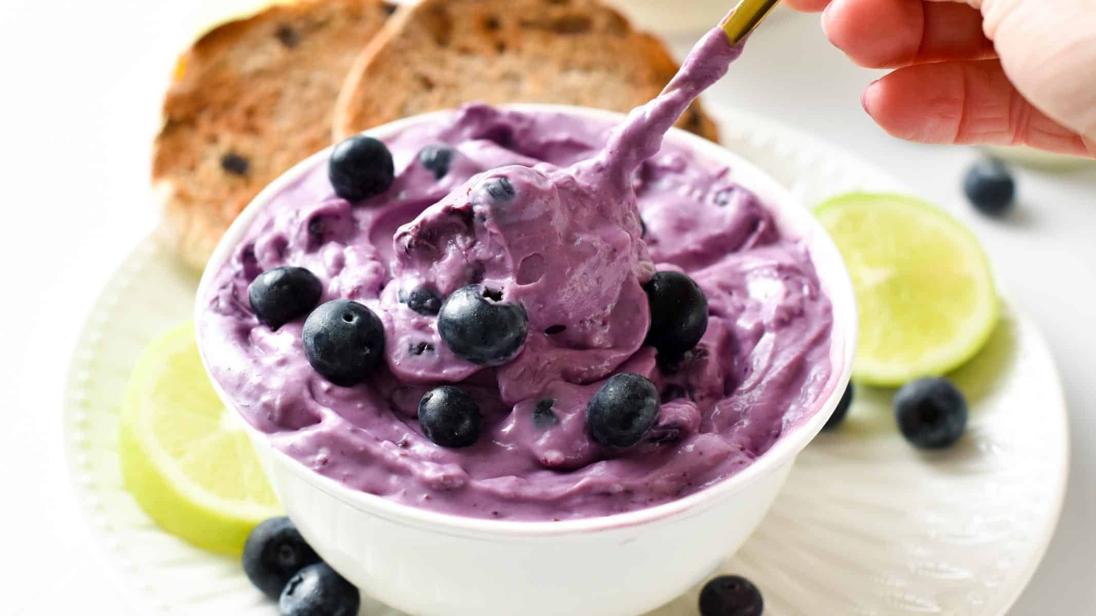 This Blueberry Cream Cheese is a tasty sweet cream cheese spread that taste like blueberry cheesecake. It's a delicious addition to toasted English muffins, and bagels or to eat by the spoon as a sweet treat.This Blueberry Cream Cheese is a tasty sweet cream cheese spread that taste like blueberry cheesecake. It's a delicious addition to toasted English muffins, and bagels or to eat by the spoon as a sweet treat.