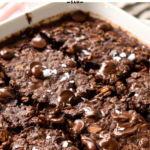This Baked Brownie Oatmeal is a creamy chocolate baked oatmeal recipe filled packed with 9 grams protein per serve for a fulfilling healthy breakfastThis Baked Brownie Oatmeal is a creamy chocolate baked oatmeal recipe filled packed with 9 grams protein per serve for a fulfilling healthy breakfast