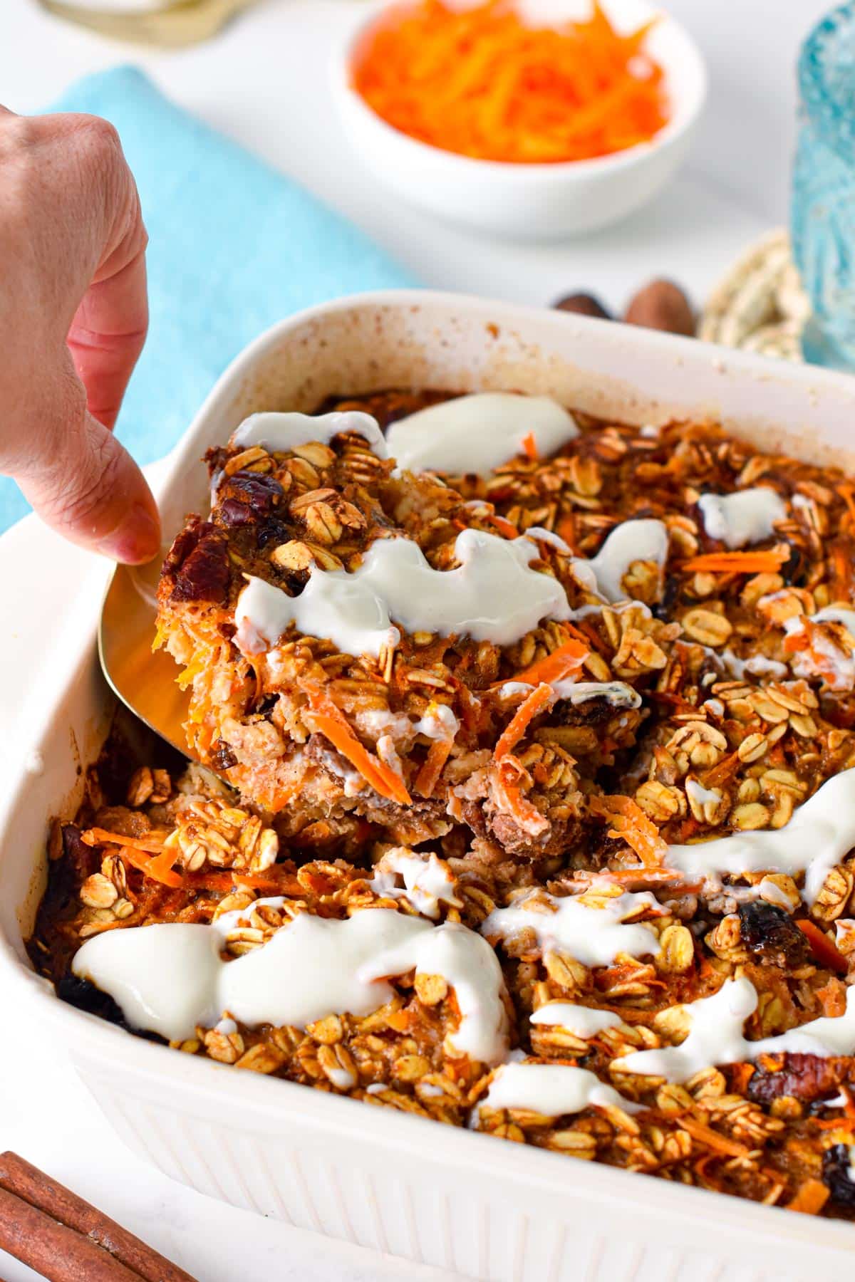 This Carrot Cake Baked Oatmeal is an easy one-pan oatmeal to serve a delicious carrot-cake flavor oatmeal to all the family. It's the easiest healthy breakfast this Easter for carrot cake lovers.