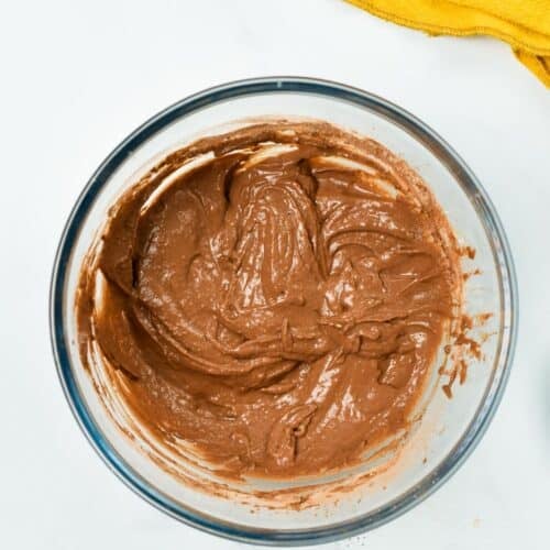 a mixing bowl filled with chocolate pancake batter