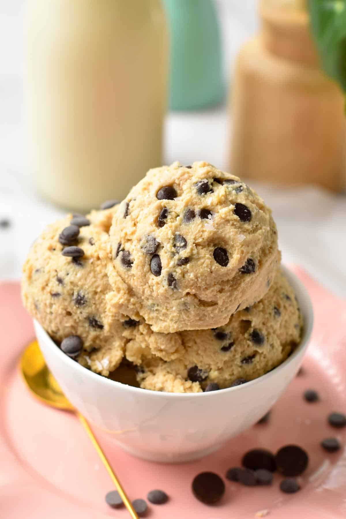 A bowl filled with cottage cheese cookie dough in a shape of ice cream scoops