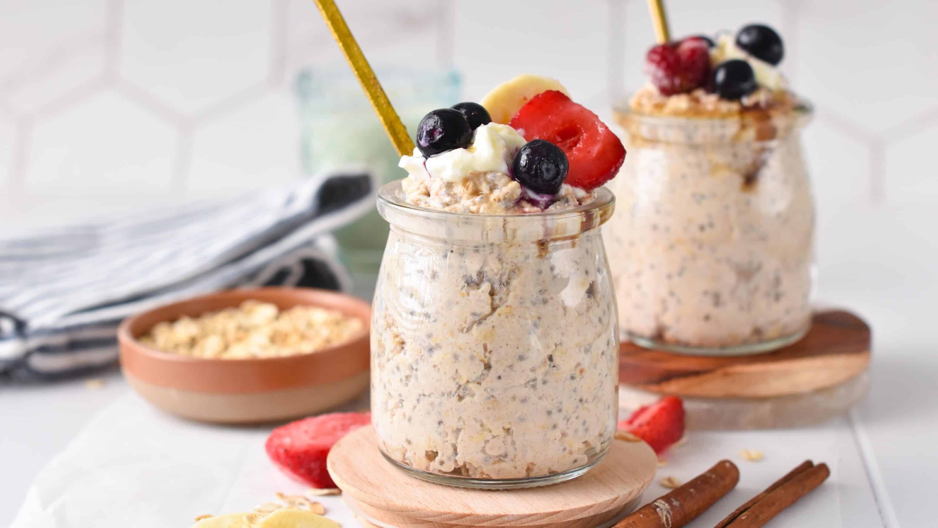 a jar of cottage cheese overnight oats with berries on top