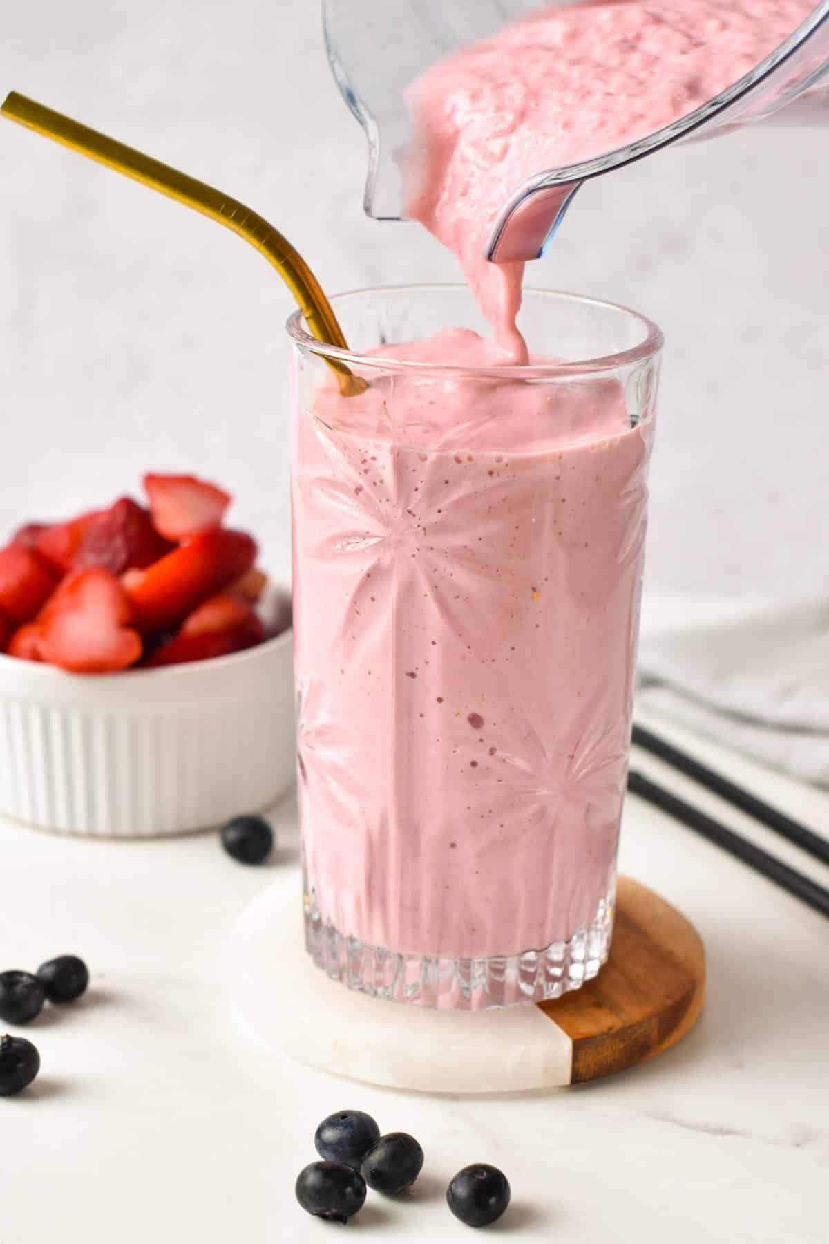 This Cottage Cheese Smoothie is a deliciously thick and creamy high-protein strawberry smoothie made from cottage cheese. With 14 grams of proteins, this is the perfect post work out snack.