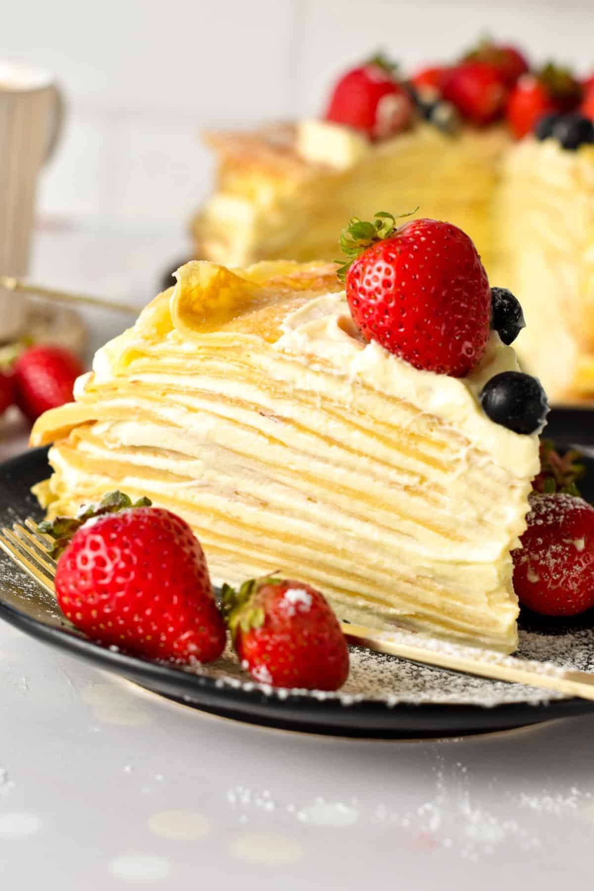 This Crepe Cake is a beautiful, decadent French cake made from layers of vanilla crepe filled with a thin layer of vanilla cream. It's a tasty cake for a birthday or dessert to impress your guest.