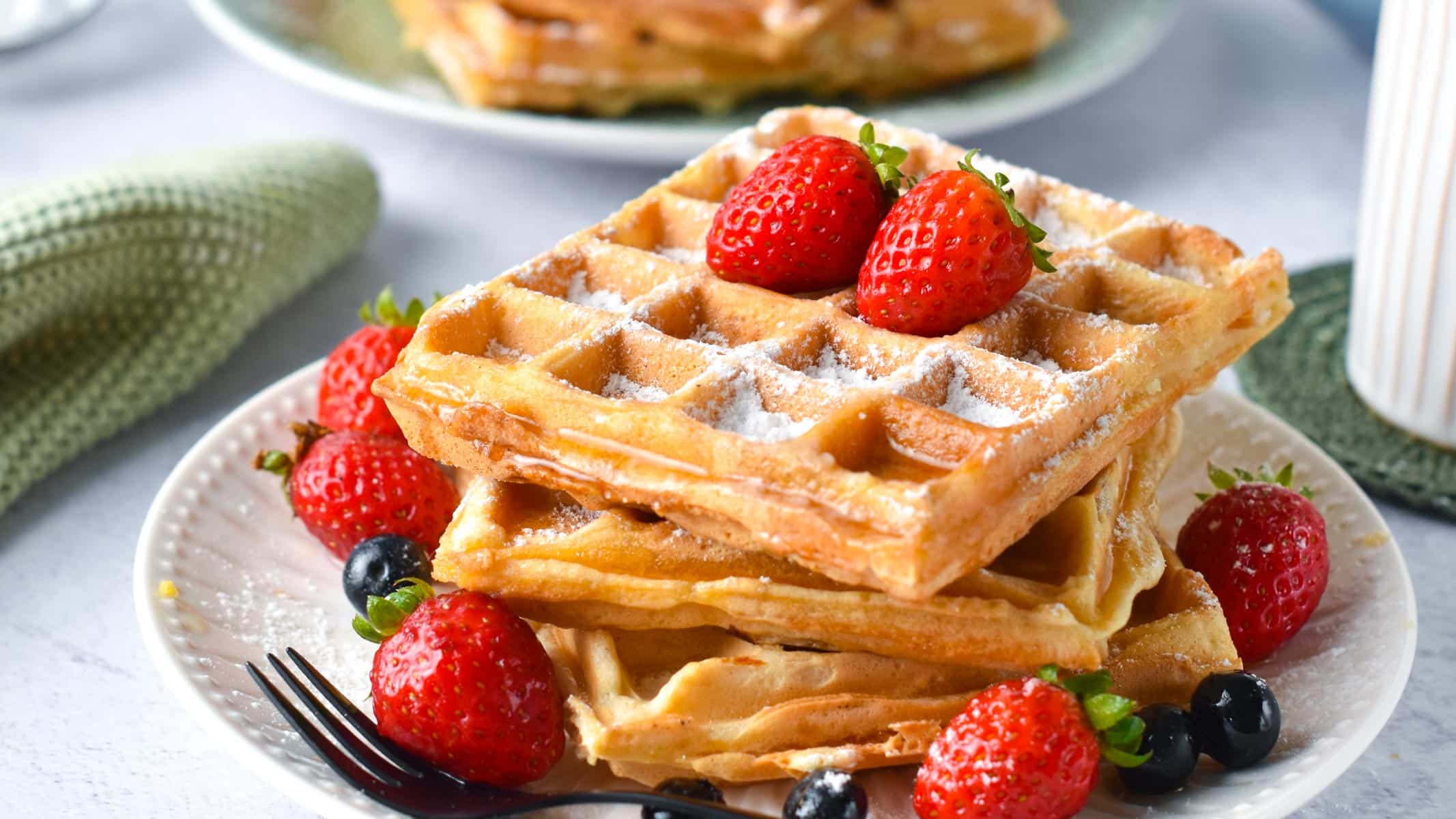 These Dairy Free Waffles are easy homemade waffles made with no milk or butter. They are light, crispy, and fluffy in the center and perfect as a comforting breakfast on the weekend.