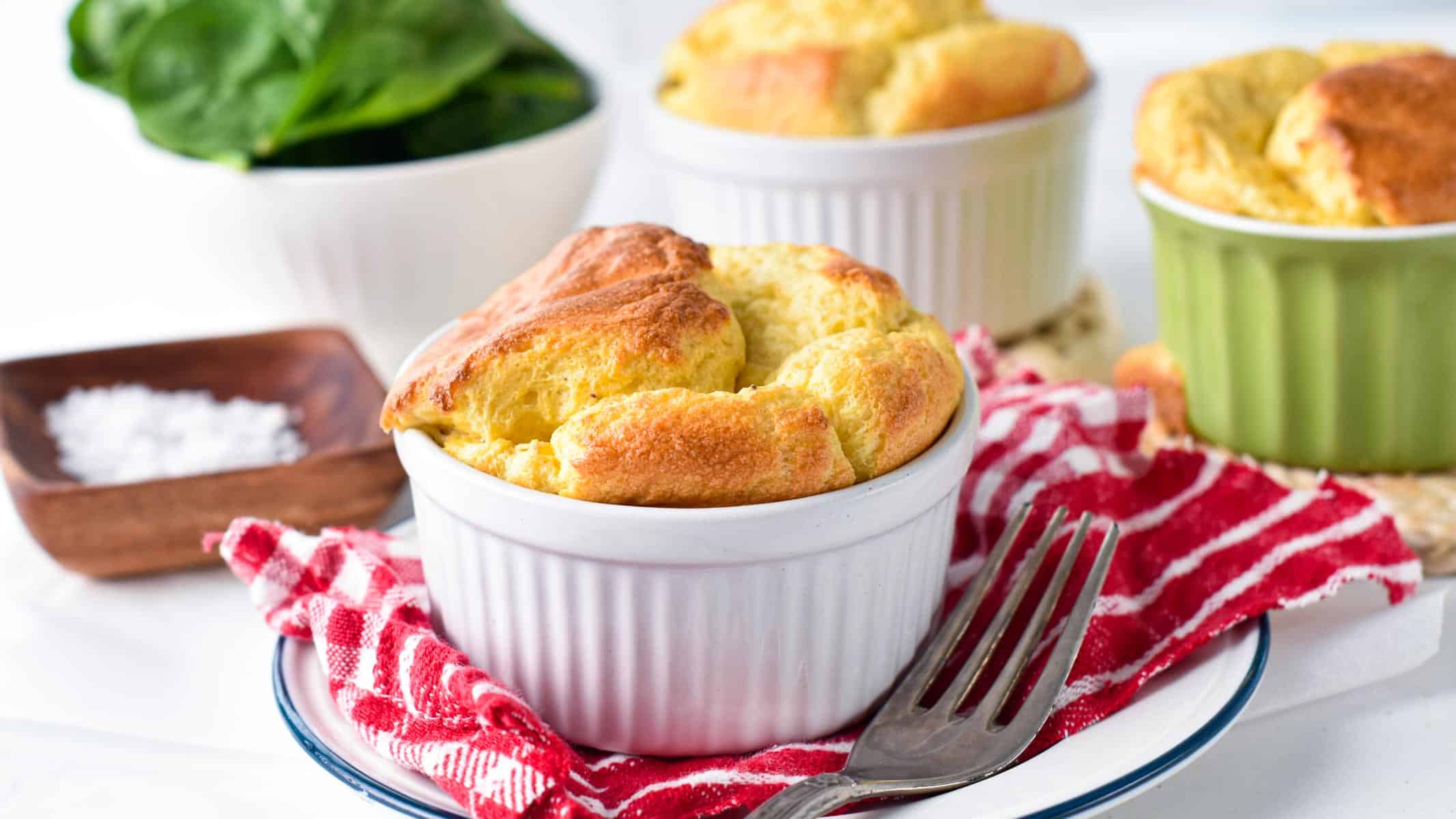 These Egg Souffles are fluffy eggs baked in single-serve ramekins with a fancy look perfect as a brunch recipe. Plus these egg souffles are ready in less than 30 minutes and are a great way to feed a breakfast crowd on the weekend with a fancy egg breakfast recipe.