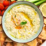 This Eggplant Dip also called Baba Ganoush recipe is a creamy Meditareean dip made from roasted eggplants, tahini and garlic. It's a delicious appetizer or spread for lunch wraps and sandwiches.
