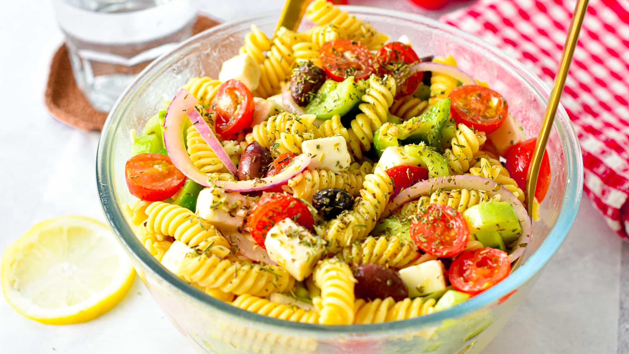 This Greek Pasta Salad is an healthy fulfilling salad packed with Greek flavors and crunchy vegetable. If you love salad as a meal, this easy 20 minutes Greek Pasta salad recipe is for you.