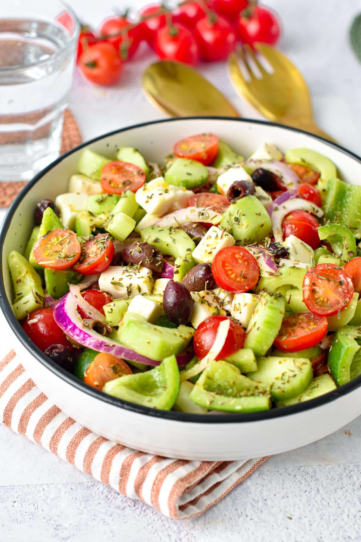 This Greek Salad Recipe is the most easy refreshing Mediterranean salad with crunchy vegetable, creamy feta cheese and tangy red wine salad dressing. Plus, all you need is barely 15 minutes to make this salad recipe so no excuse to try it now.