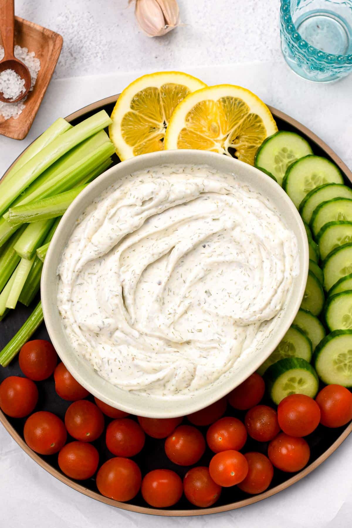 Greek Yogurt Ranch Dip in a large bowl with fresh veggies around it.