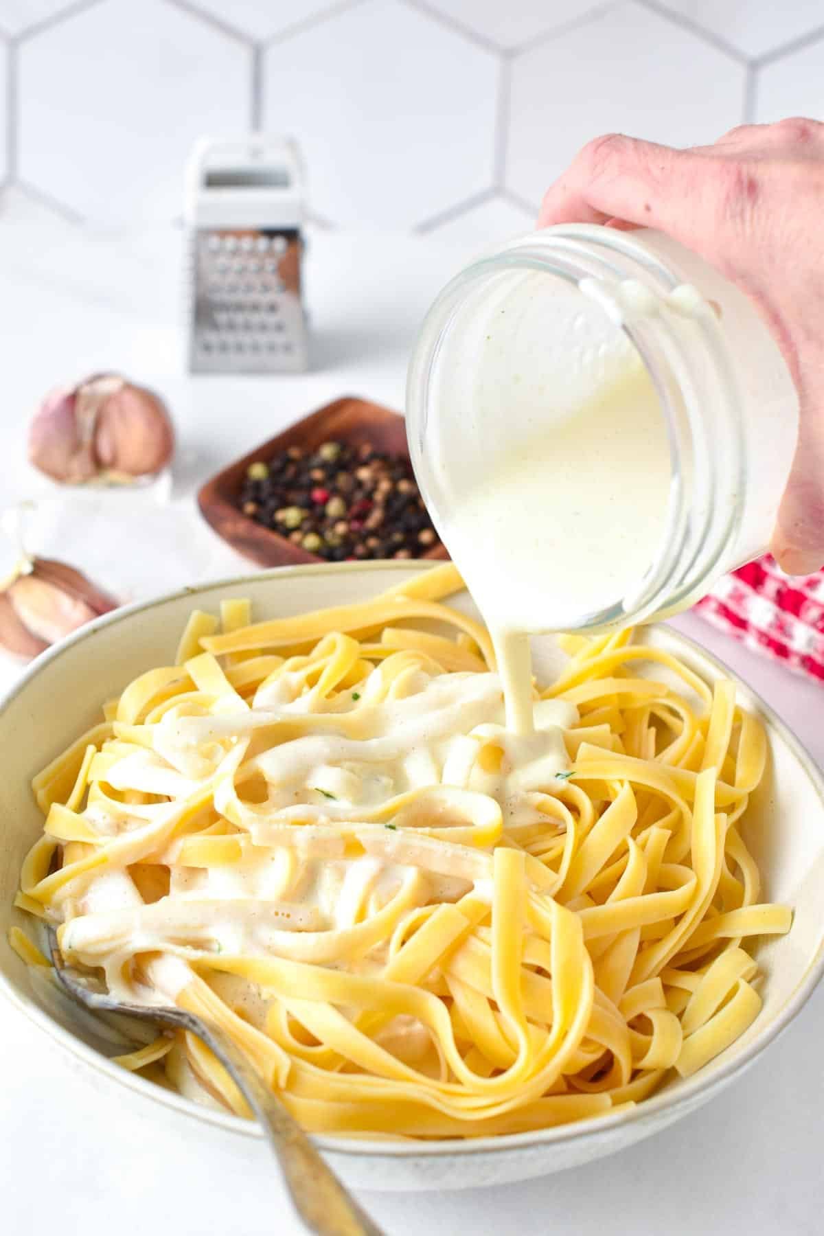 This Alfredo Greek Yogurt Pasta sauce is a lightened-up version of the traditional Alfredo sauce recipe. It's packed with proteins from Greek yogurt, lower in fats and calories but with the same delicious creamy garlic flavors you love.