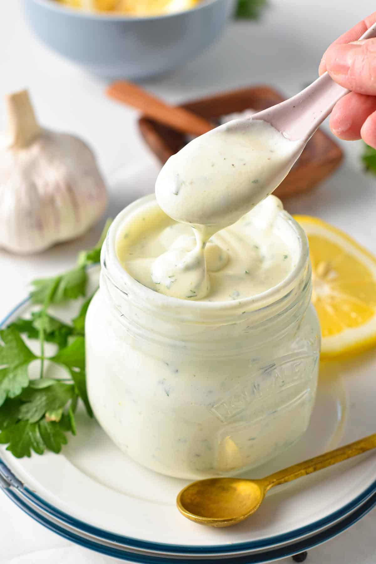 This Greek Yogurt Dressing is a creamy, high-protein salad dressing perfect to add creaminess and rich texture to any lettuce or salad. It's a healthier salad dressing too, with less calories, fat and packed with calcium and filling proteins.