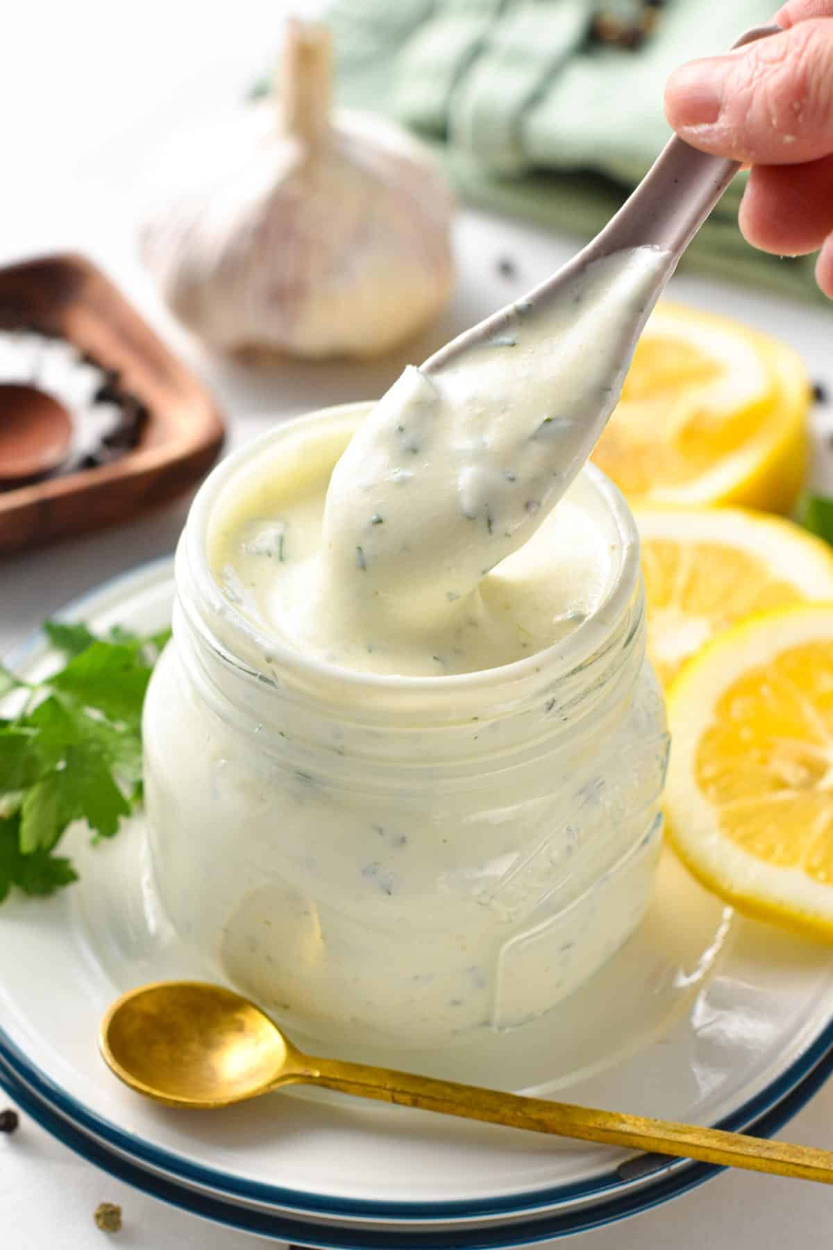 This Greek Yogurt Dressing is a creamy, high-protein salad dressing perfect to add creaminess and rich texture to any lettuce or salad. It's a healthier salad dressing too, with less calories, fat and packed with calcium and filling proteins.