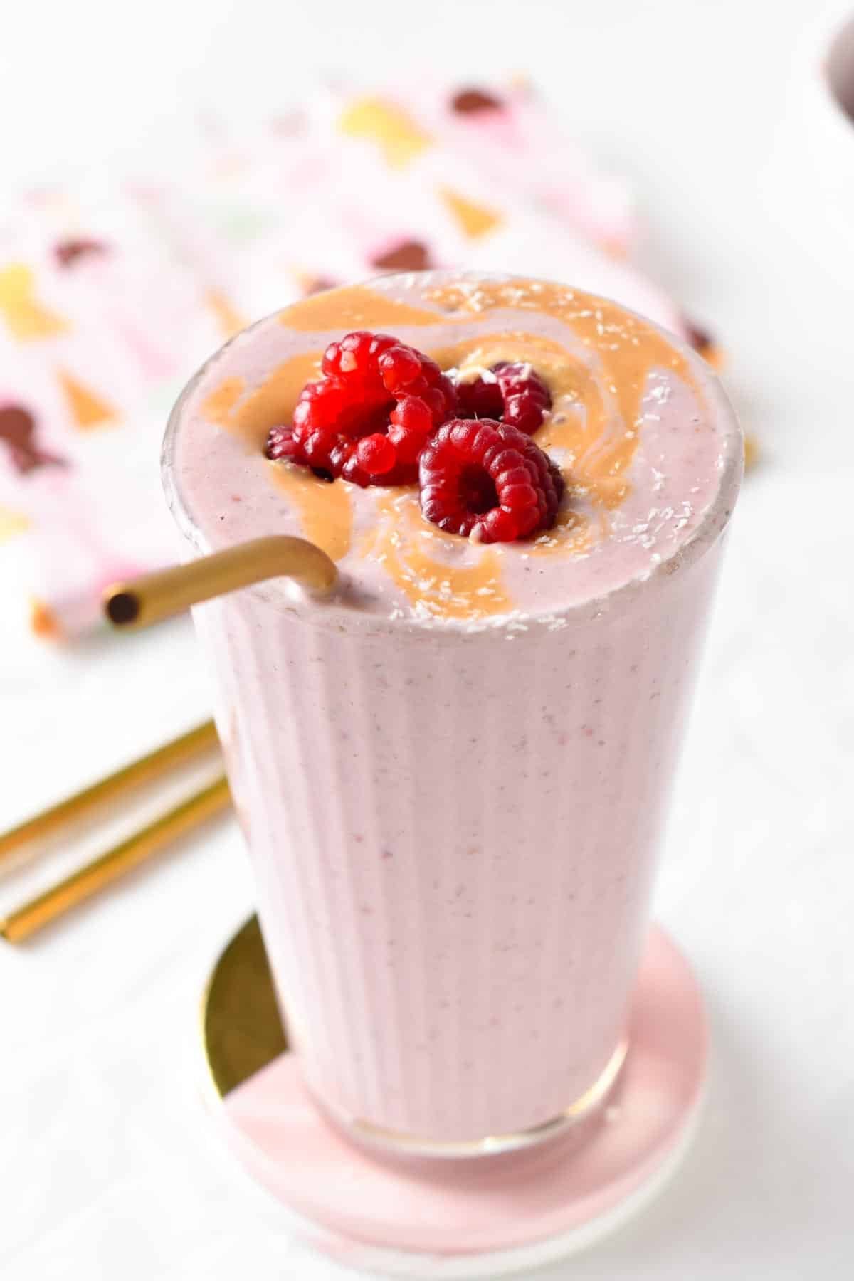 This Greek Yogurt Protein Shake is a deliciously creamy and smooth raspberry protein shake packed with 40 grams of proteins. 