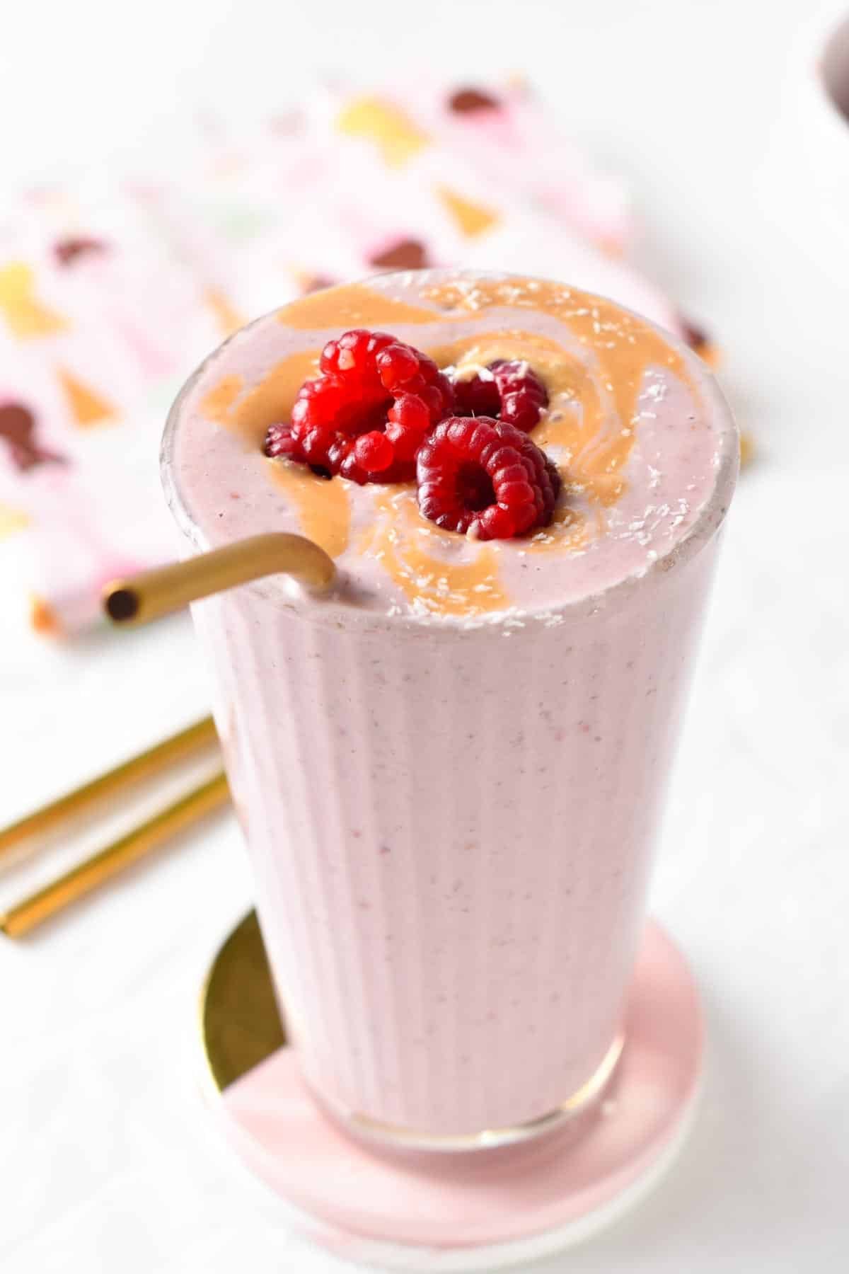 This Greek Yogurt Protein Shake is a deliciously creamy and smooth raspberry protein shake packed with 40 grams of proteins.