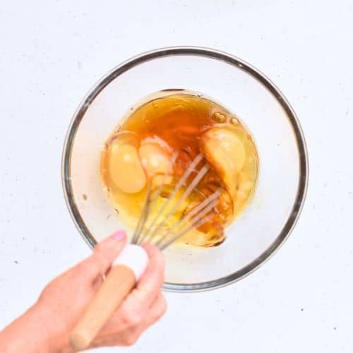 Liquid Almond Flour Cake ingredients in a bowl.