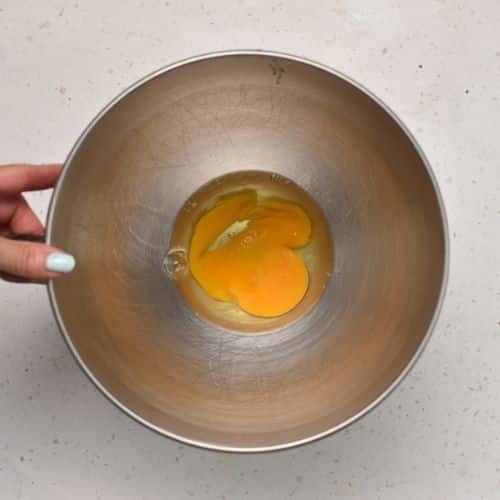 Eggs for the Cloud Cookies in a bowl.