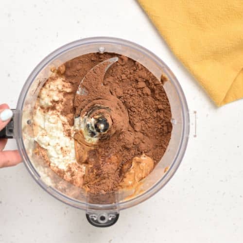 Cottage Cheese Brownie ingredients in a food processor.