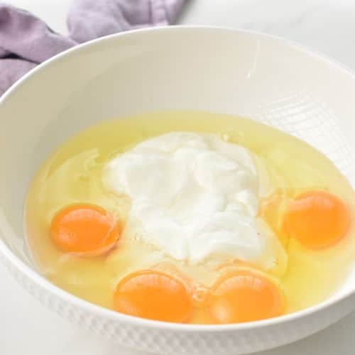 Liquid Greek Yogurt Protein Muffin ingredients in a mixing bowl.
