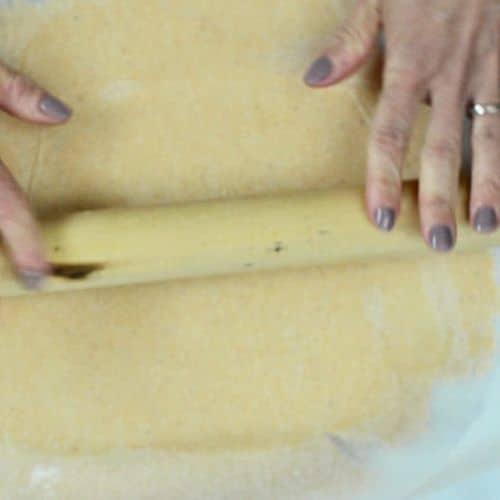 Rolling the Keto Pumpkin Pie crust.