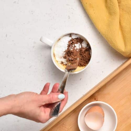 Combining Protein Mug Cake ingredients.