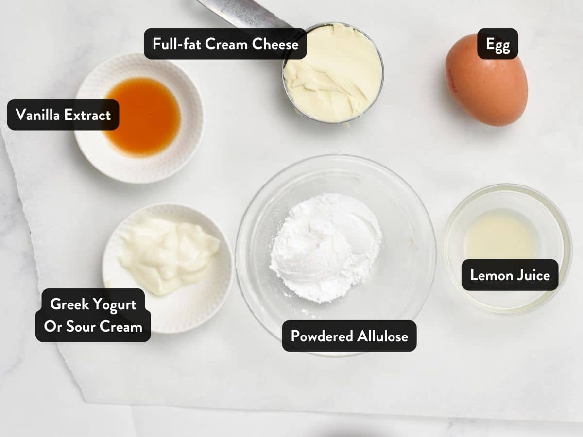 Ingredients for the Keto Mug Cheesecake in small jars and ramekins.