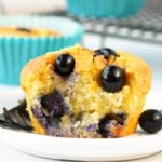 the inside of a keto blueberry muffins with juicy blueberries