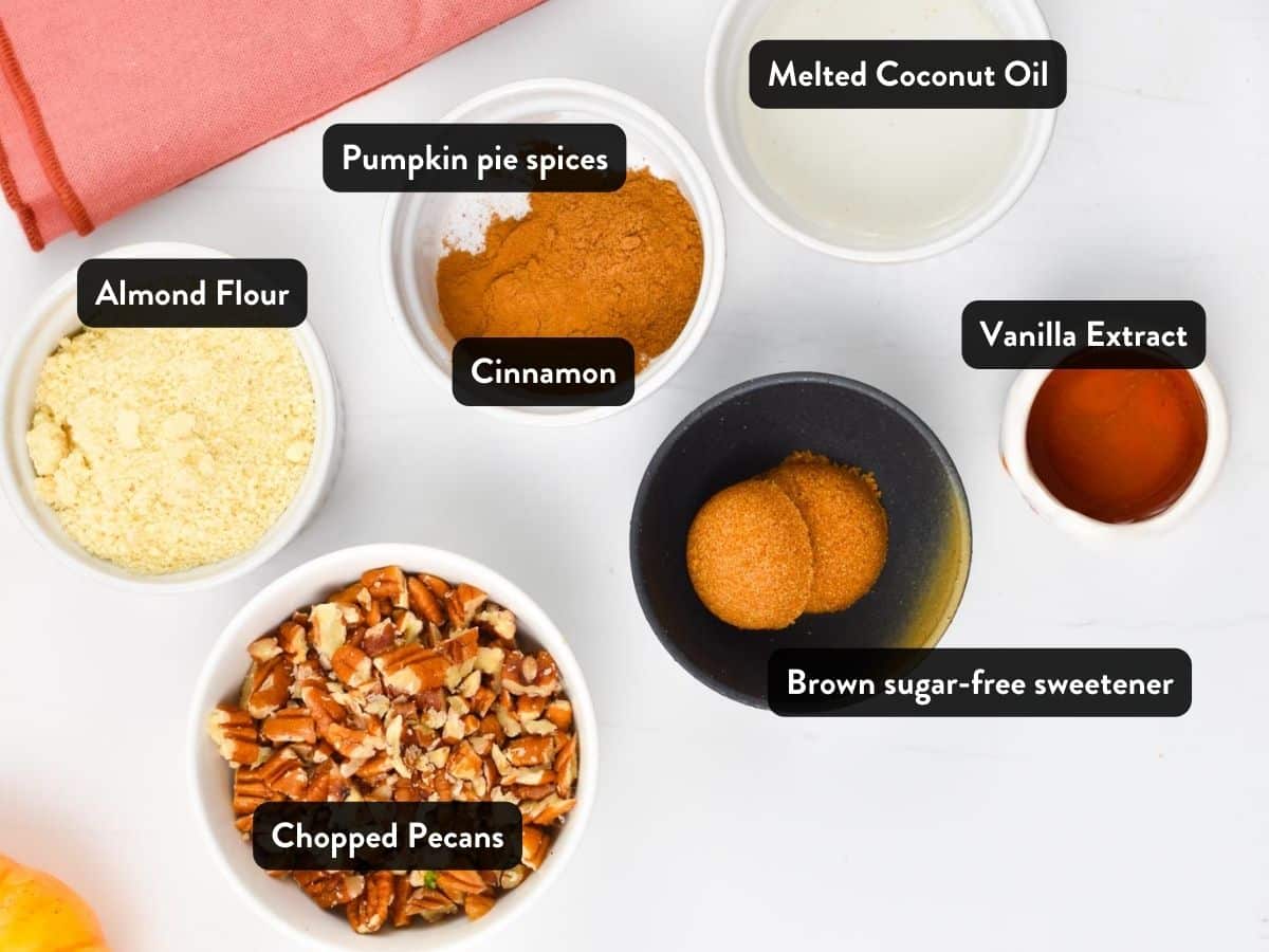Keto Pumpkin Cake crumbly topping  ingredient in various bowls with labels.