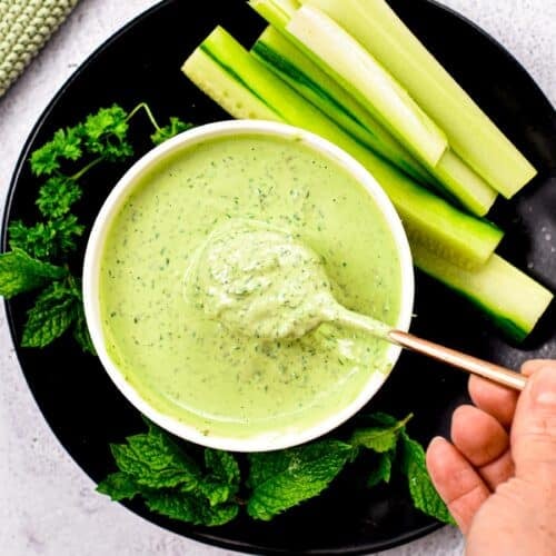 This Lemon Herb Tahini is a creamy salad dressing packed with a combination of three fresh herbs for a flavorsome dressing packed with vitamins and nutrients.