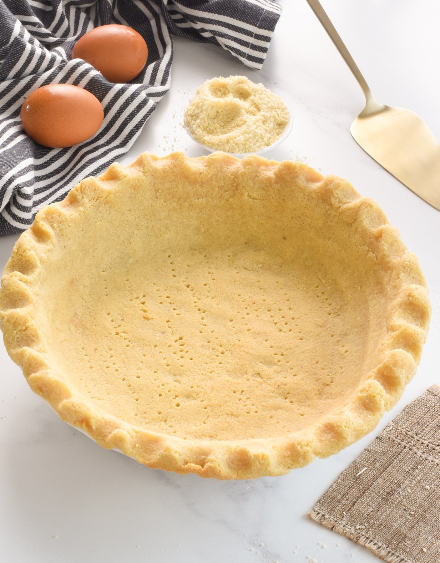 Low Carb Pie Crust pricked and pre-baked