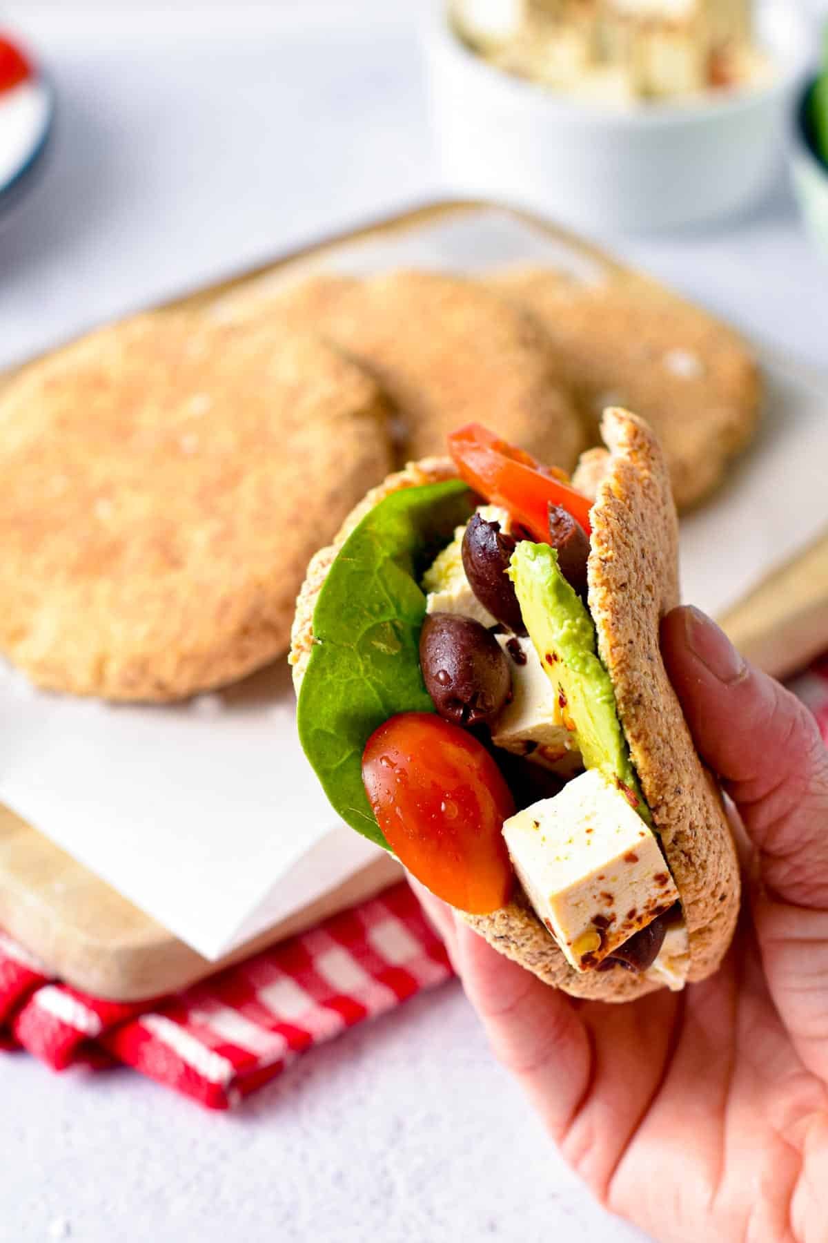 These low carb pita bread are soft, pita flatbread made from low-carb flours and no eggs so you can share with your vegan keto guest. Plus, one pita bread only contains 4.4 g net carbs and they are gluten-free.These low carb pita bread are soft, pita flatbread made from low-carb flours and no eggs so you can share with your vegan keto guest. Plus, one pita bread only contains 4.4 g net carbs and they are gluten-free.