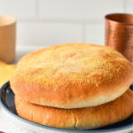 These easy Moroccan Bread are typical Moroccan white bread also called Khobz and traditionally served as a side to Moroccan meals. They are crispy on the outside, with a light semolina flour crispy layer and soft in the middle.These easy Moroccan Bread are typical Moroccan white bread also called Khobz and traditionally served as a side to Moroccan meals. They are crispy on the outside, with a light semolina flour crispy layer and soft in the middle.