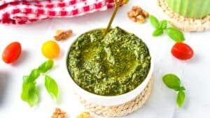 This Pesto without pine nuts is an easy healthy pesto perfect if you run out of pine nuts or have nuts allergies. Plus, this pesto recipe is ready in barely 5 minutes, and use a good amount of basil to use the overgrown herbs in your garden.