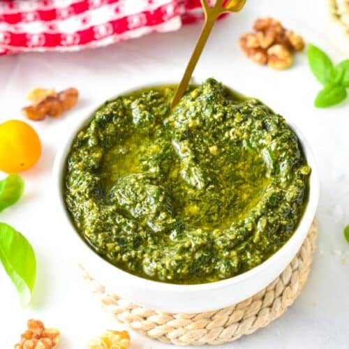 This Pesto without pine nuts is an easy healthy pesto perfect if you run out of pine nuts or have nuts allergies. Plus, this pesto recipe is ready in barely 5 minutes, and use a good amount of basil to use the overgrown herbs in your garden.