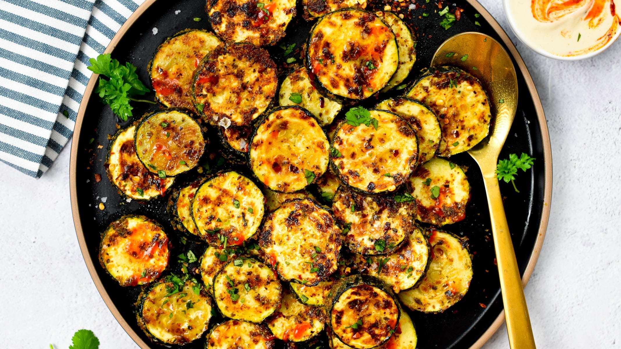 These Roasted Zucchini recipe is the most easy side dish recipe ever packed with summer flavors. Plus, it's low-carb, vegan and gluten-free so all the family can enjoy it.These Roasted Zucchini recipe is the most easy side dish recipe ever packed with summer flavors. Plus, it's low-carb, vegan and gluten-free so all the family can enjoy it.