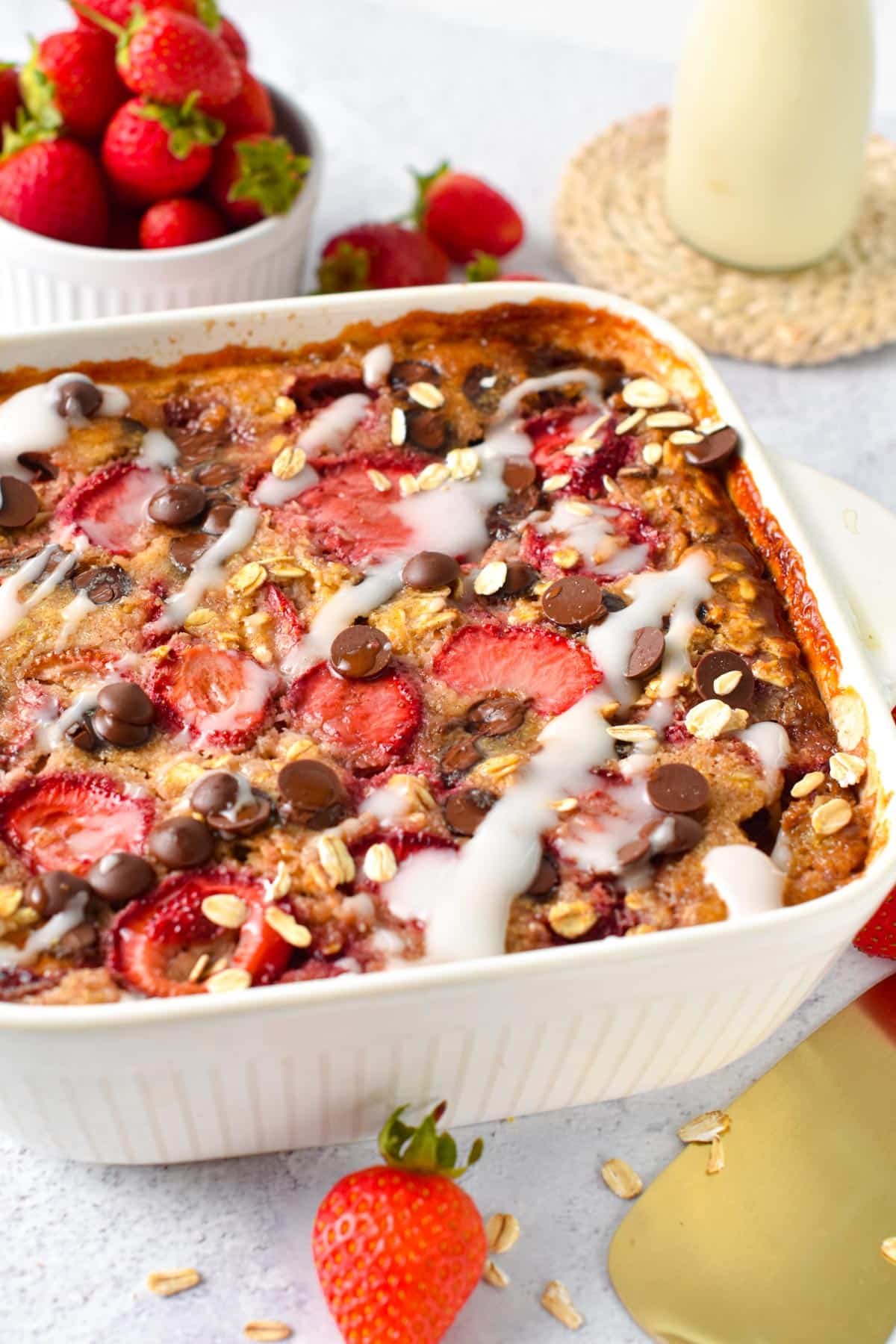 Strawberry Baked Oatmeal baked in a ceramic pan.