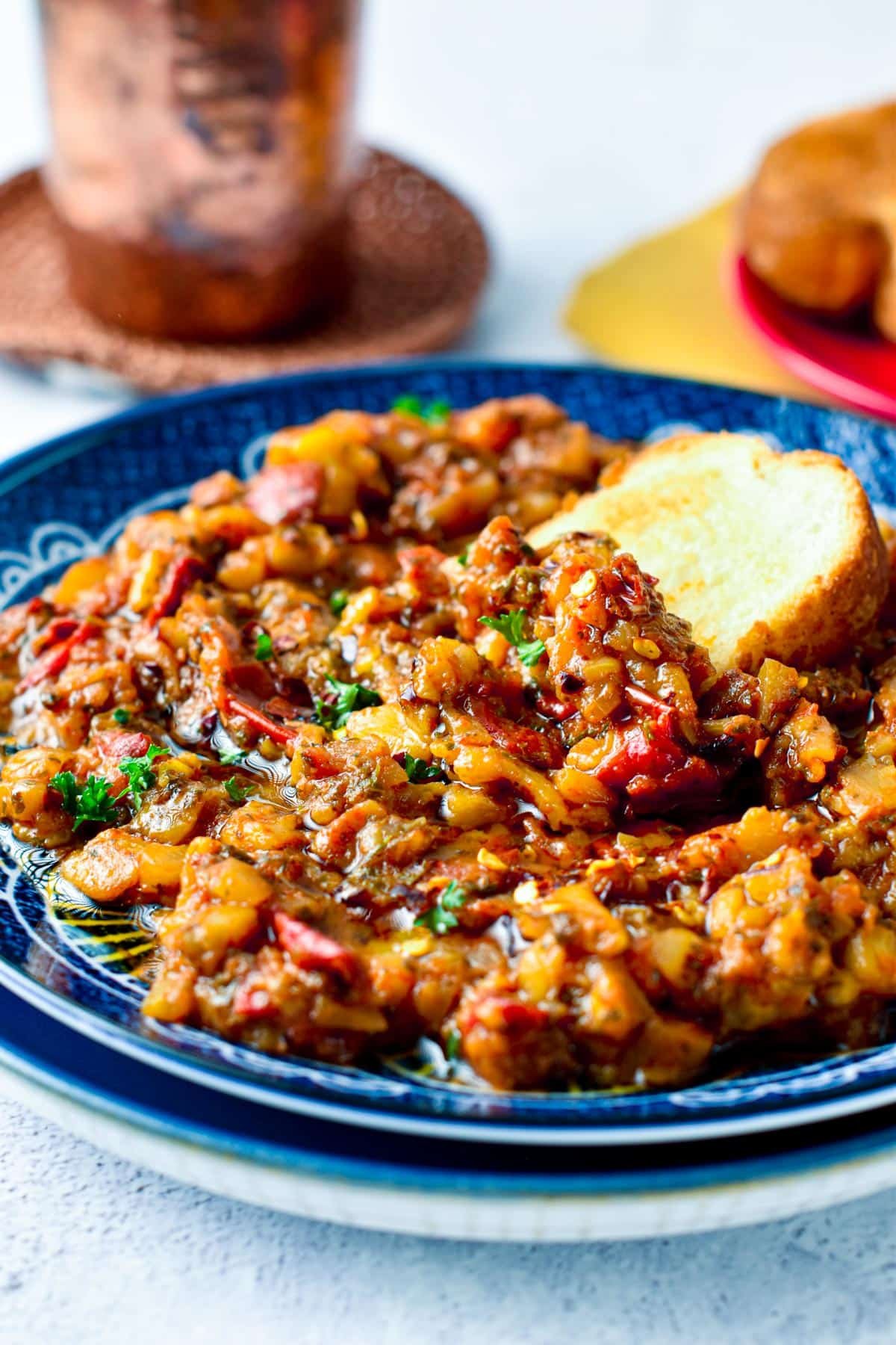 This one-pan Zaalouk recipe is the most easy flavorsome Moroccan eggplant cold dip for bread or side to Moroccan dish. Plus, this recipe is also suitable for anyone as it's naturally low-carb, gluten-free and vegan approved.