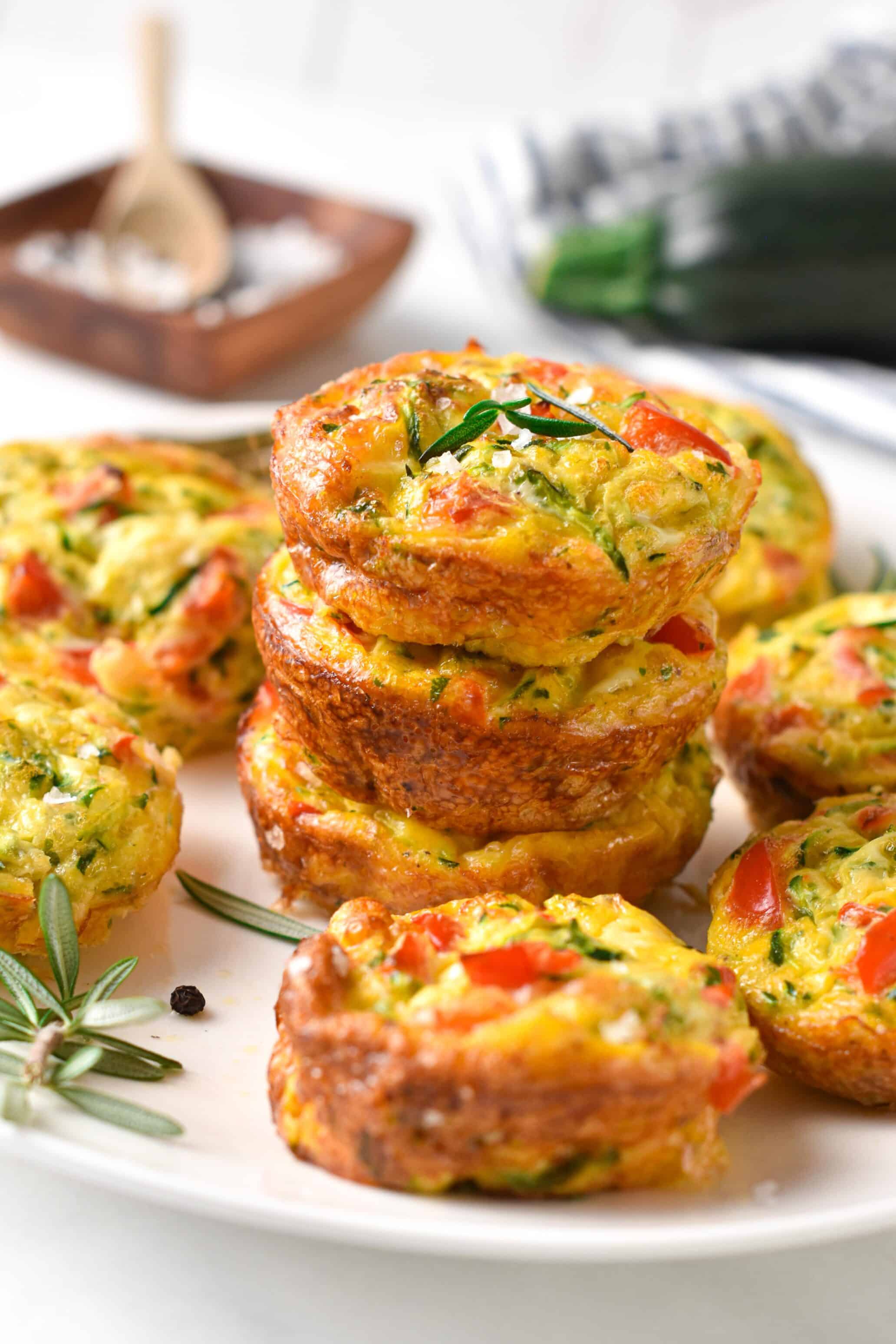 Stack of Zucchini Egg Muffins on a table.