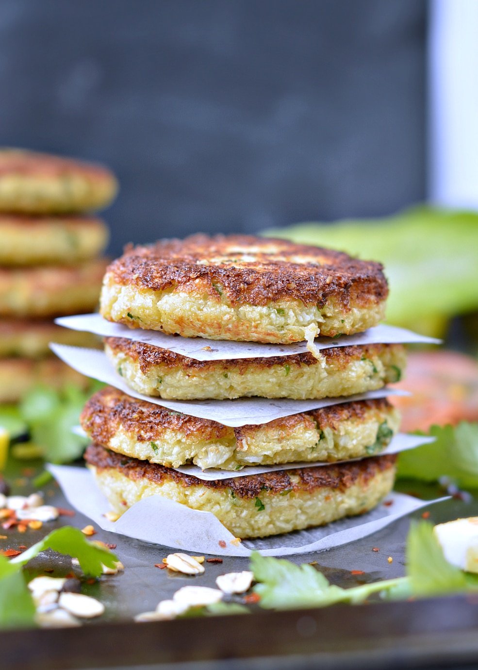  Healthy Paleo Cauliflower fritters, low carb and gluten free. An easy and tasty 4 ingredients crispy fritter recipe perfect as a clean eating meal on its own or to fill burger buns.