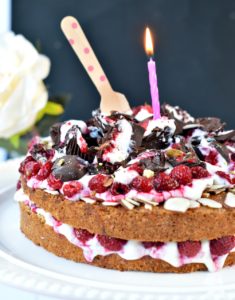 Healthy Sugar free vanilla cake with whipped cream and raspberries. An easy and delicious low carb birthday cake recipe with stevia. Diabetes friendly, gluten free.